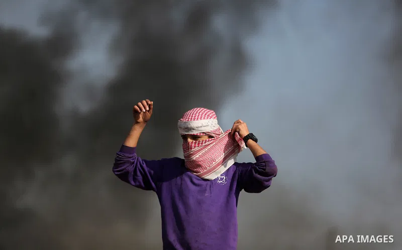 Palestinian protesters clash with Israeli security forces, against US President Donald Trump's decision to recognise Jerusalem as the capital of Israel, near the border with Israel in the southern Gaza Strip on February...