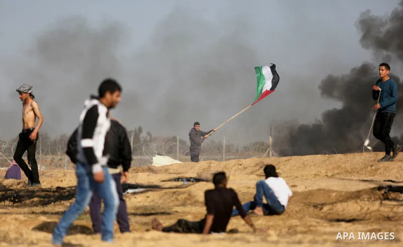 Palestinian protesters clash with Israeli security forces, against US President Donald Trump's decision to recognise Jerusalem as the capital of Israel, near the border with Israel in the southern Gaza Strip on February...