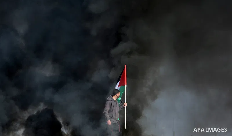 Palestinian protesters clash with Israeli security forces, against US President Donald Trump's decision to recognise Jerusalem as the capital of Israel, near the border with Israel in the southern Gaza Strip on February...