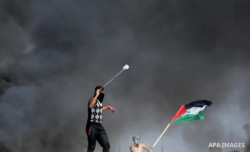 Palestinian protesters clash with Israeli security forces, against US President Donald Trump's decision to recognise Jerusalem as the capital of Israel, near the border with Israel in the southern Gaza Strip on February...