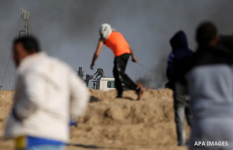 Palestinian protesters clash with Israeli security forces, against US President Donald Trump's decision to recognise Jerusalem as the capital of Israel, near the border with Israel in the southern Gaza Strip on February...