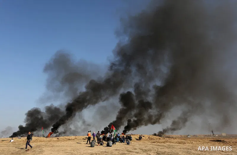 Palestinian protesters clash with Israeli security forces, against US President Donald Trump's decision to recognise Jerusalem as the capital of Israel, near the border with Israel in the southern Gaza Strip on February...
