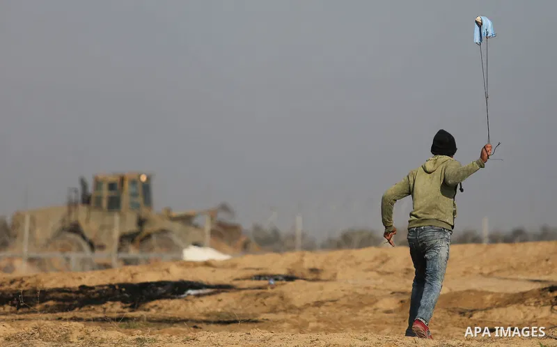 Palestinian protesters clash with Israeli security forces, against US President Donald Trump's decision to recognise Jerusalem as the capital of Israel, near the border with Israel in the southern Gaza Strip on February...