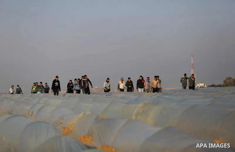 Palestinian protesters clash with Israeli security forces, against US President Donald Trump's decision to recognise Jerusalem as the capital of Israel, near the border with Israel in the southern Gaza Strip on February...