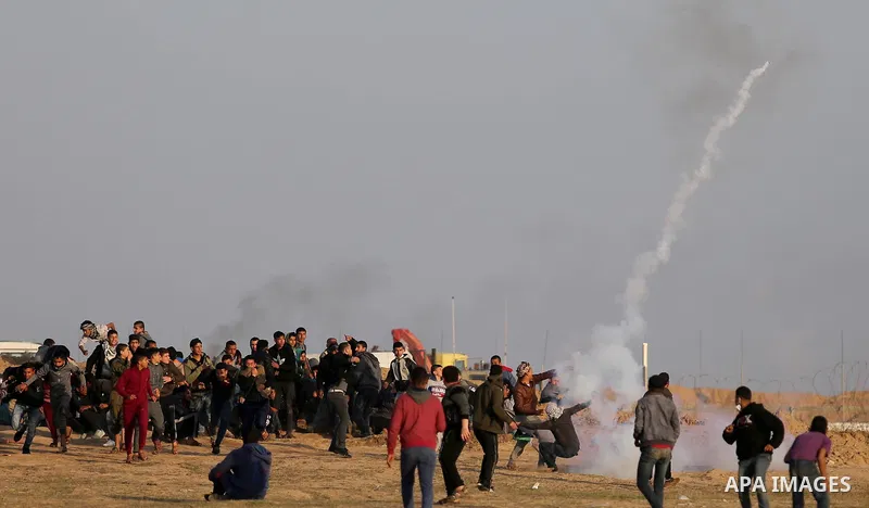 Palestinian protesters clash with Israeli security forces, against US President Donald Trump's decision to recognise Jerusalem as the capital of Israel, near the border with Israel in the southern Gaza Strip on February...