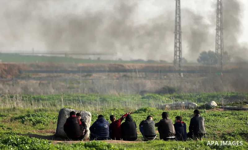 Palestinian protesters clash with Israeli security forces, against US President Donald Trump's decision to recognise Jerusalem as the capital of Israel, near the border with Israel, east of Gaza City on February 2, 2018....