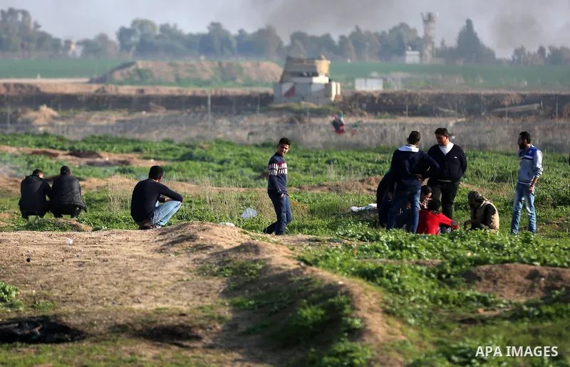 Palestinian protesters clash with Israeli security forces, against US President Donald Trump's decision to recognise Jerusalem as the capital of Israel, near the border with Israel, east of Gaza City on February 2, 2018....