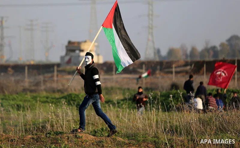 Palestinian protesters clash with Israeli security forces, against US President Donald Trump's decision to recognise Jerusalem as the capital of Israel, near the border with Israel, east of Gaza City on February 2, 2018....