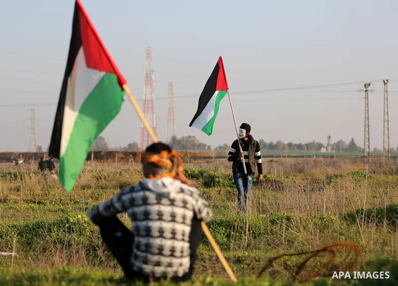 Palestinian protesters clash with Israeli security forces, against US President Donald Trump's decision to recognise Jerusalem as the capital of Israel, near the border with Israel, east of Gaza City on February 2, 2018....