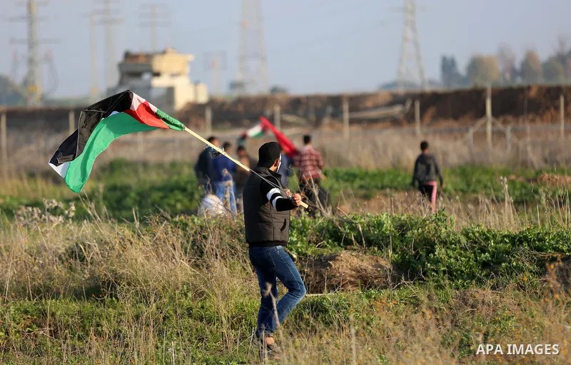 Palestinian protesters clash with Israeli security forces, against US President Donald Trump's decision to recognise Jerusalem as the capital of Israel, near the border with Israel, east of Gaza City on February 2, 2018....