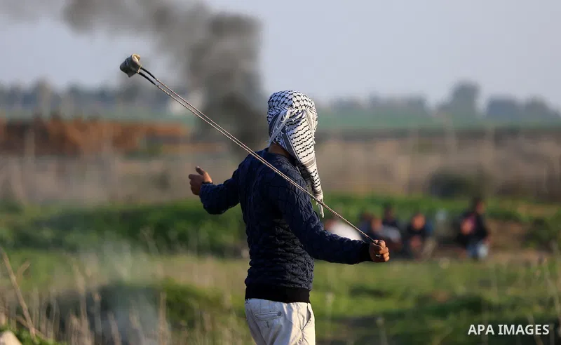Palestinian protesters clash with Israeli security forces, against US President Donald Trump's decision to recognise Jerusalem as the capital of Israel, near the border with Israel, east of Gaza City on February 2, 2018....