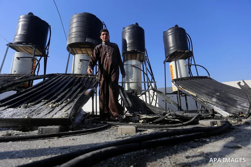 Palestinians check the damage after an attack carried out by the Israeli army in Beit Hanun in the northern Gaza Strip on February 2, 2018. Israeli forces struck a Hamas position in Gaza early today after a rocket was fi...