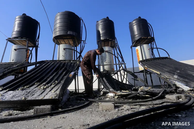 Palestinians check the damage after an attack carried out by the Israeli army in Beit Hanun in the northern Gaza Strip on February 2, 2018. Israeli forces struck a Hamas position in Gaza early today after a rocket was fi...