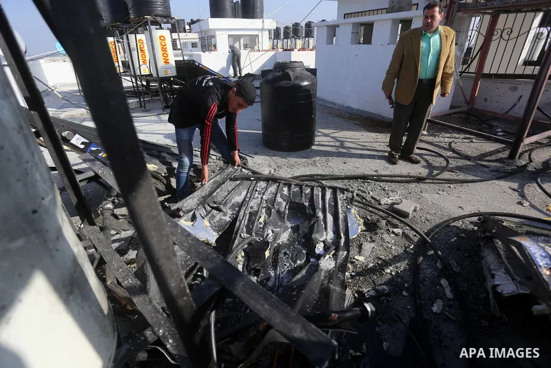 Palestinians check the damage after an attack carried out by the Israeli army in Beit Hanun in the northern Gaza Strip on February 2, 2018. Israeli forces struck a Hamas position in Gaza early today after a rocket was fi...