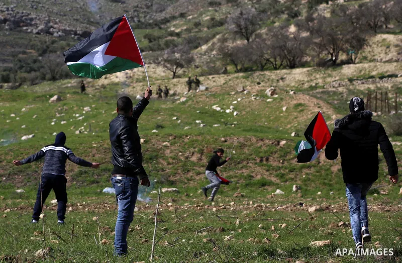 Palestinian protesters clash with Israeli security forces following a demonstration near the Hawara checkpoint, south of the West Bank city of Nablus on February 2, 2018, as demonstrations continue over the US president'...