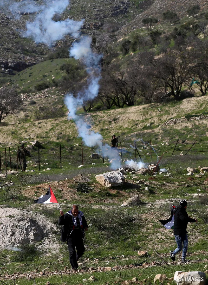 Palestinian protesters clash with Israeli security forces following a demonstration near the Hawara checkpoint, south of the West Bank city of Nablus on February 2, 2018, as demonstrations continue over the US president'...