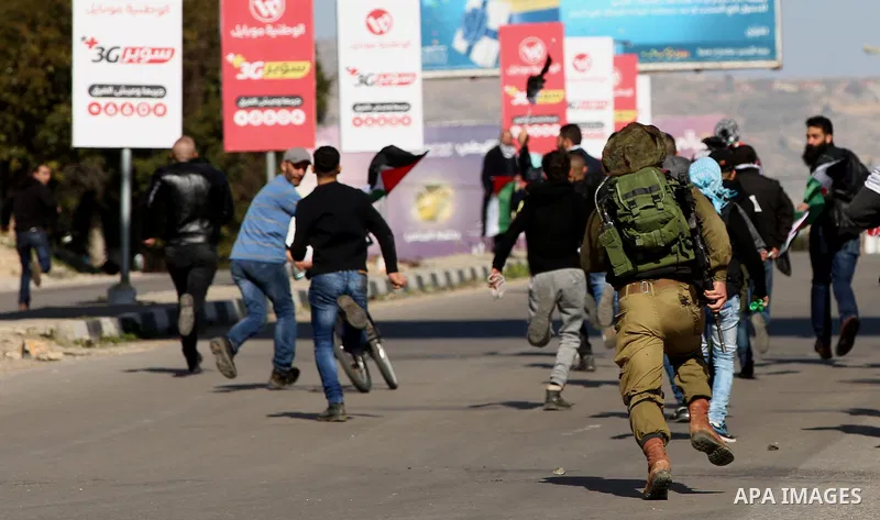 Palestinian protesters clash with Israeli security forces following a demonstration near the Hawara checkpoint, south of the West Bank city of Nablus on February 2, 2018, as demonstrations continue over the US president'...