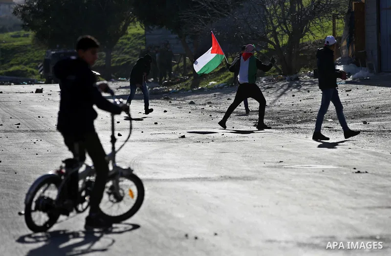 Palestinian protesters clash with Israeli security forces following a demonstration near the Hawara checkpoint, south of the West Bank city of Nablus on February 2, 2018, as demonstrations continue over the US president'...
