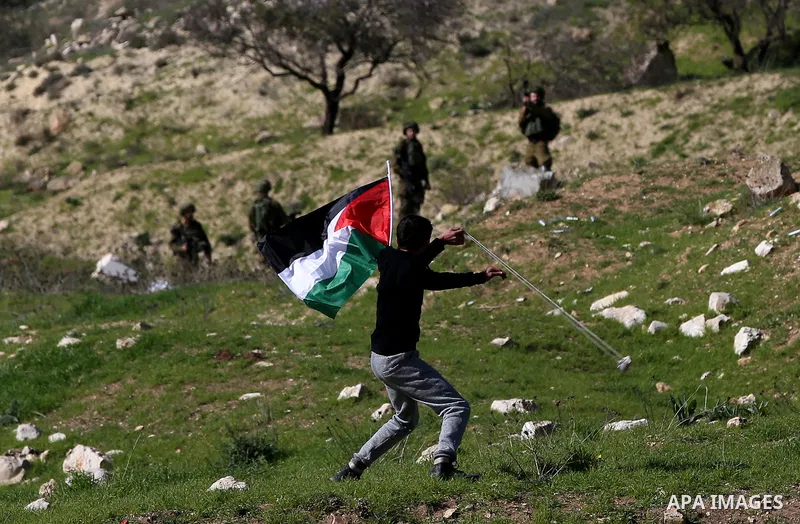 Palestinian protesters clash with Israeli security forces following a demonstration near the Hawara checkpoint, south of the West Bank city of Nablus on February 2, 2018, as demonstrations continue over the US president'...
