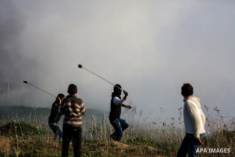 Palestinian protesters clash with Israeli security forces near the border with Israel, east of Gaza City on February 2, 2018 as demonstrations continue over the US president's controversial recognition of Jerusalem as Is...