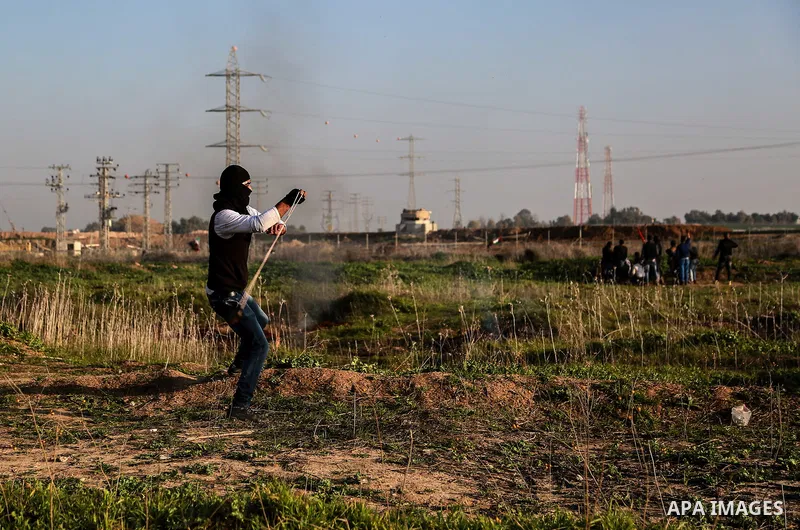 Palestinian protesters clash with Israeli security forces near the border with Israel, east of Gaza City on February 2, 2018 as demonstrations continue over the US president's controversial recognition of Jerusalem as Is...