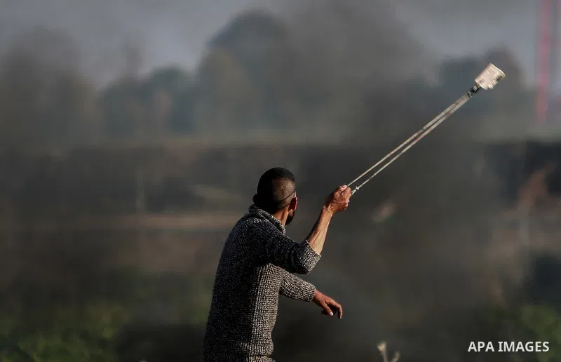 Palestinian protesters clash with Israeli security forces near the border with Israel, east of Gaza City on February 2, 2018 as demonstrations continue over the US president's controversial recognition of Jerusalem as Is...