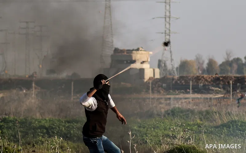 Palestinian protesters clash with Israeli security forces near the border with Israel, east of Gaza City on February 2, 2018 as demonstrations continue over the US president's controversial recognition of Jerusalem as Is...