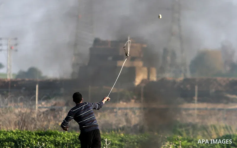 Palestinian protesters clash with Israeli security forces near the border with Israel, east of Gaza City on February 2, 2018 as demonstrations continue over the US president's controversial recognition of Jerusalem as Is...