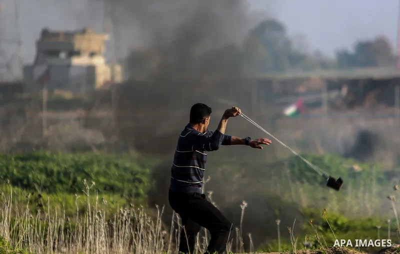 Palestinian protesters clash with Israeli security forces near the border with Israel, east of Gaza City on February 2, 2018 as demonstrations continue over the US president's controversial recognition of Jerusalem as Is...
