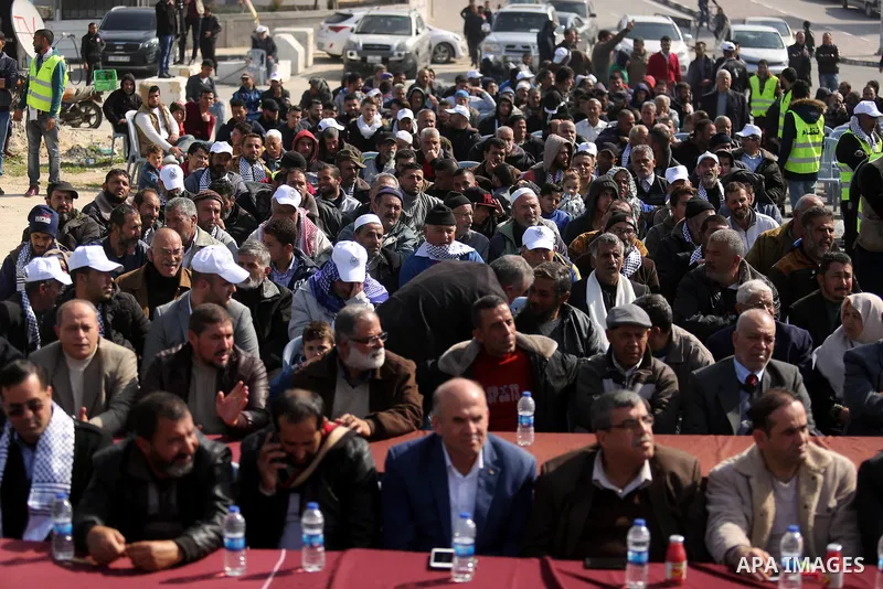 Palestinian fishermen attend a ceremony of support Palestinian fishermen project funded by the national islamic committee for development and social solidarity, in Gaza sea port on February 3, 2018. Photo by Ashraf Amra