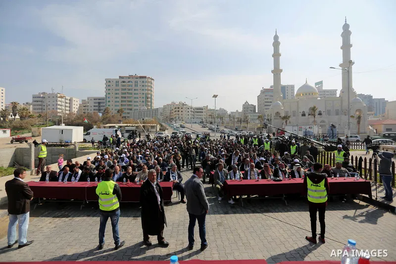 Palestinian fishermen attend a ceremony of support Palestinian fishermen project funded by the national islamic committee for development and social solidarity, in Gaza sea port on February 3, 2018. Photo by Ashraf Amra
