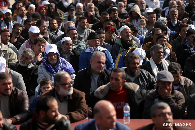 Palestinian fishermen attend a ceremony of support Palestinian fishermen project funded by the national islamic committee for development and social solidarity, in Gaza sea port on February 3, 2018. Photo by Ashraf Amra