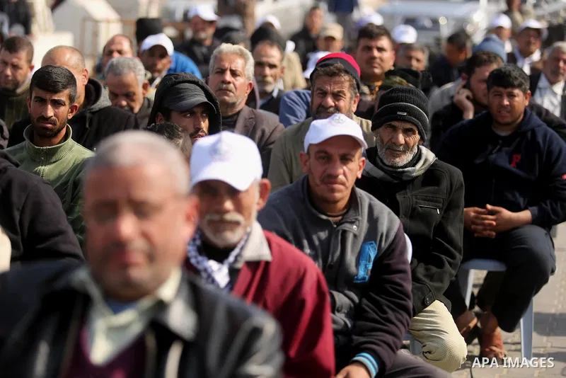Palestinian fishermen attend a ceremony of support Palestinian fishermen project funded by the national islamic committee for development and social solidarity, in Gaza sea port on February 3, 2018. Photo by Ashraf Amra