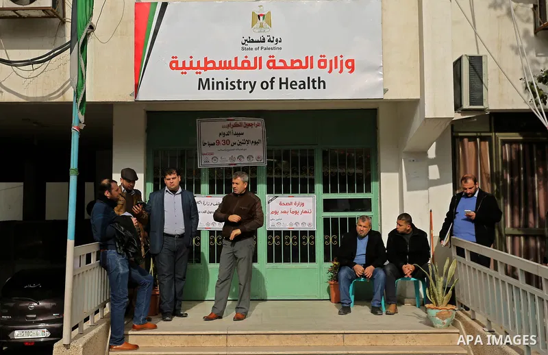Palestinian Ministry of Health employees take part during a protest demanding their rights and against deterioration of health conditions in front of Ministry of Health headquarter in Gaza city on February 5, 2018. Photo...