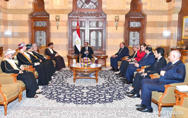 Egyptian President Abdel Fattah al-Sisi meets with Deputy Prime Minister of Oman Fahd bin Mahmoud al-Said in the Gulf sultanate of Oman on February 5, 2018. Photo by Egyptian President Office