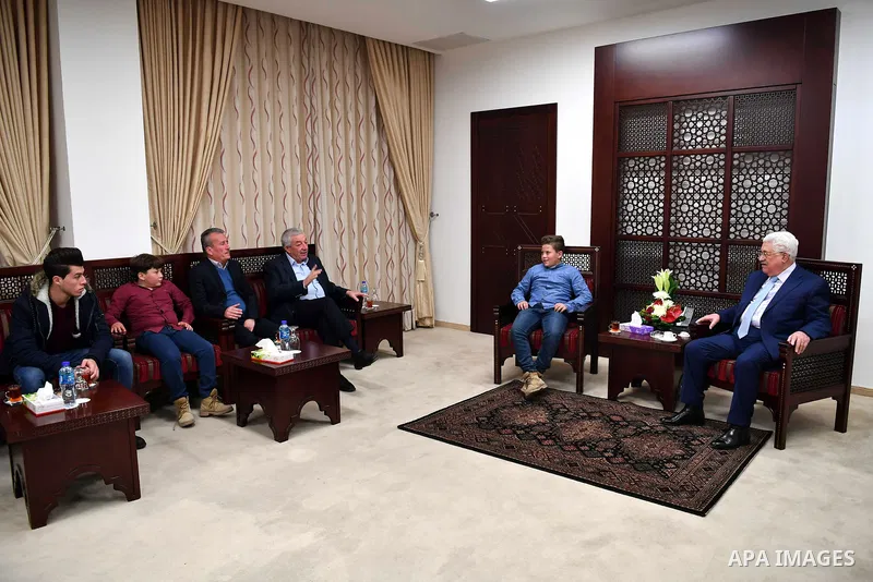 Palestinian President Mahmoud Abbas meets with the family of Palestinian prisoner teenager Ahed Tamimi, at his headquarter in the West Bank city of Ramallah on February 5, 2018. Photo by Thaer Ganaim