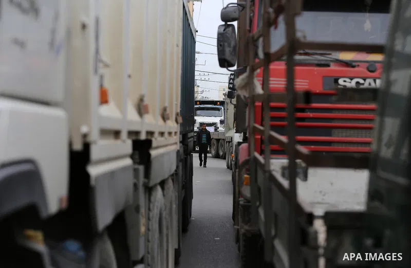 Palestinian truck drivers take part in a protest against the siege on the Gaza Strip, on February 6, 2018 in Gaza City. Israel has maintained a siege on Gaza for a decade which it says is necessary to limit Hamas, the Is...