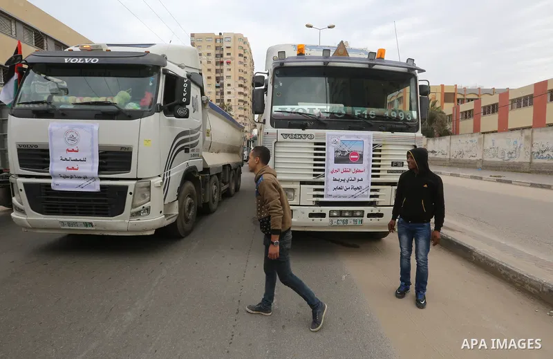 Palestinian truck drivers take part in a protest against the siege on the Gaza Strip, on February 6, 2018 in Gaza City. Israel has maintained a siege on Gaza for a decade which it says is necessary to limit Hamas, the Is...
