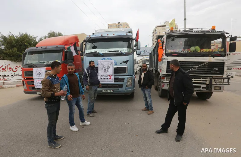 Palestinian truck drivers take part in a protest against the siege on the Gaza Strip, on February 6, 2018 in Gaza City. Israel has maintained a siege on Gaza for a decade which it says is necessary to limit Hamas, the Is...