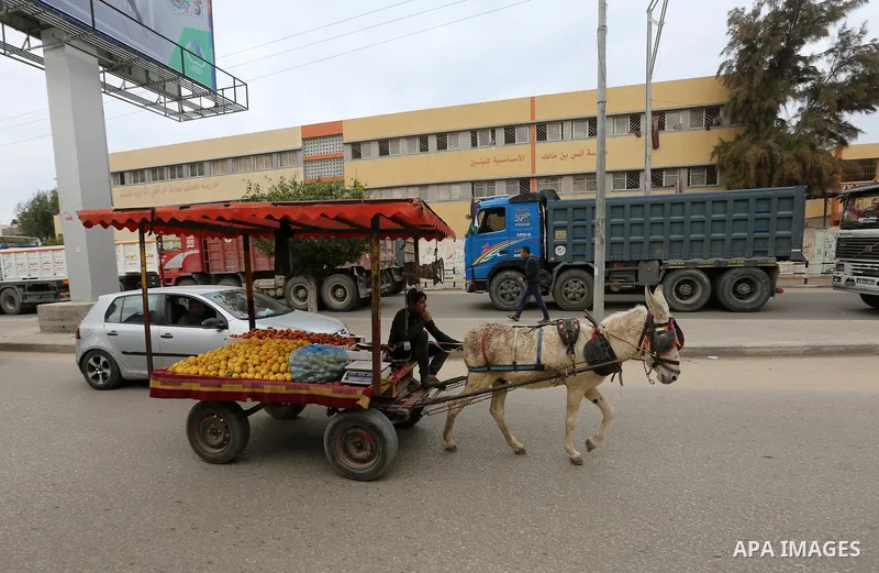 Palestinian truck drivers take part in a protest against the siege on the Gaza Strip, on February 6, 2018 in Gaza City. Israel has maintained a siege on Gaza for a decade which it says is necessary to limit Hamas, the Is...