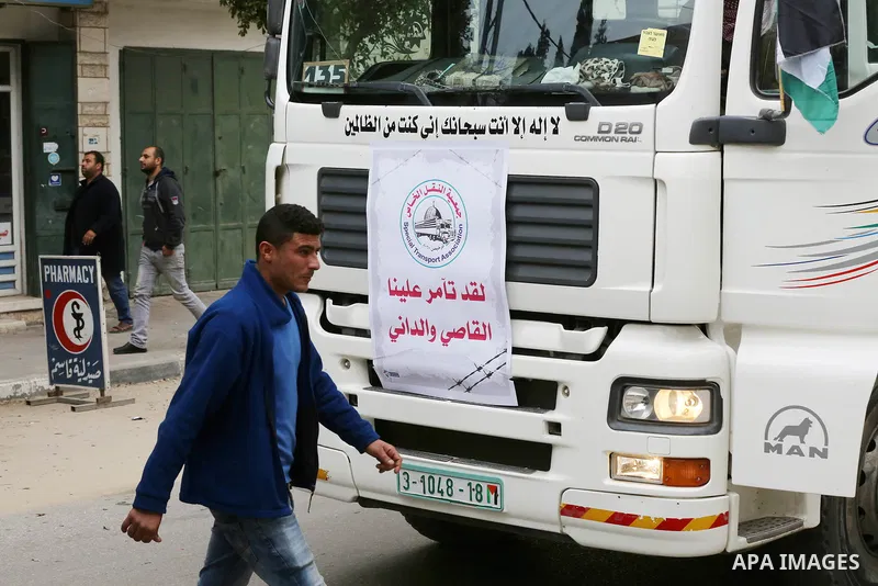 Palestinian truck drivers take part in a protest against the siege on the Gaza Strip, on February 6, 2018 in Gaza City. Israel has maintained a siege on Gaza for a decade which it says is necessary to limit Hamas, the Is...