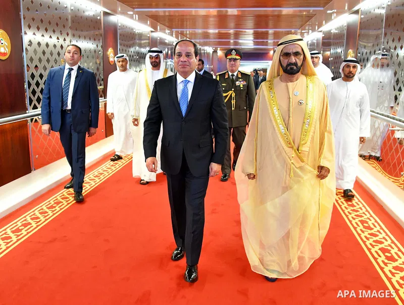 Egyptian President Abdel Fattah al-Sisi walks along side with Sheikh Mohammed bin Rashid Al Maktoum, Prime Minister and Vice-President of the United Arab Emirates and Ruler of Dubai, in Abu Dhabi, United Arab Emirates on...