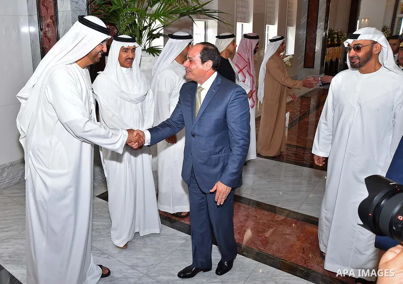 Egyptian President Abdel Fattah al-Sisi shakes hands with UAE officials, before he leavese Abu Dhabi, on February 07, 2018. Photo by Egyptian President Office