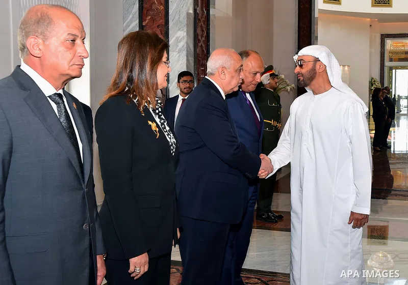 Abu Dhabi Crown Prince Mohammed bin Zayed al-Nahyan shakes hands with Egyptian officials before Egyptian President Abdel Fattah al-Sisi leaves Abu Dhabi, on February 07, 2018. Photo by Egyptian President Office