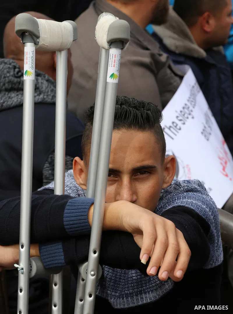 Wounded and disabled Palestinians take part in a protest against the siege on the Gaza Strip, at Erez crossing, in the northern Gaza Strip, on February 8, 2018. Israel has maintained a siege on Gaza for a decade which it...