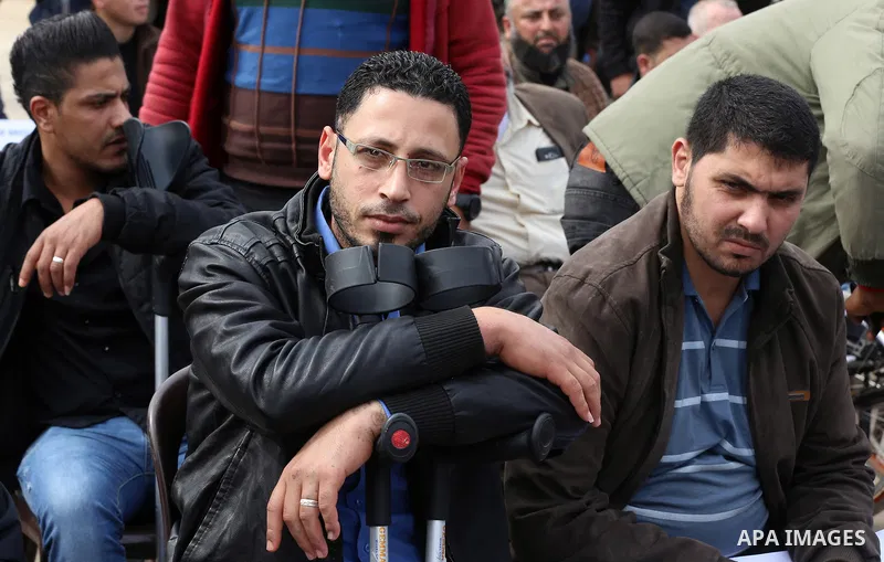Wounded and disabled Palestinians take part in a protest against the siege on the Gaza Strip, at Erez crossing, in the northern Gaza Strip, on February 8, 2018. Israel has maintained a siege on Gaza for a decade which it...