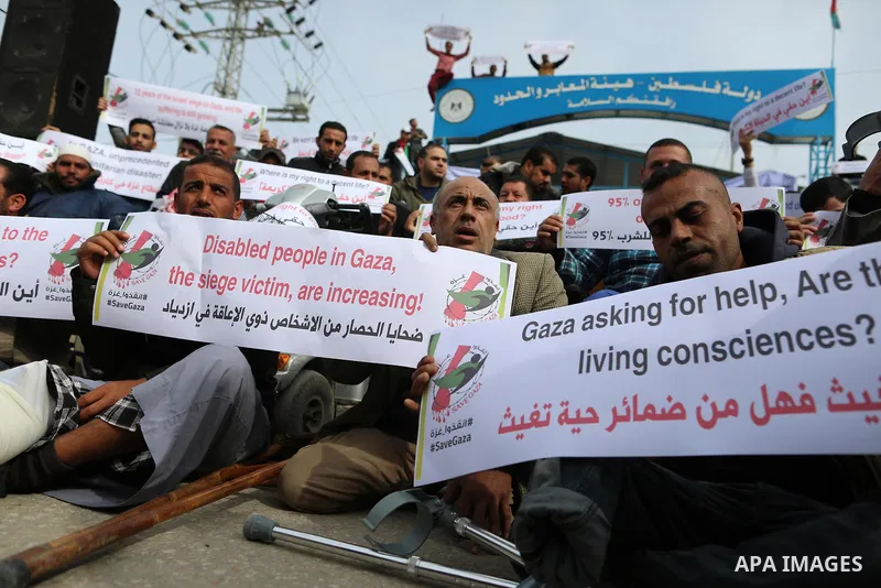 Wounded and disabled Palestinians take part in a protest against the siege on the Gaza Strip, at Erez crossing, in the northern Gaza Strip, on February 8, 2018. Israel has maintained a siege on Gaza for a decade which it...