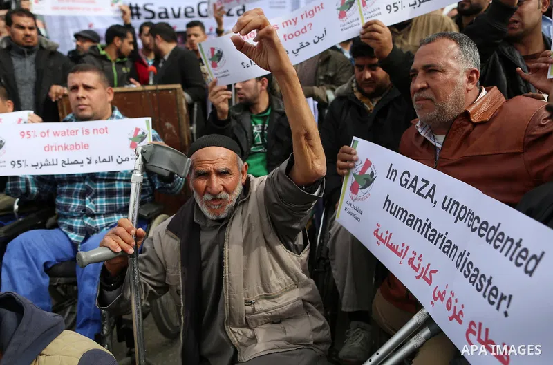 Wounded and disabled Palestinians take part in a protest against the siege on the Gaza Strip, at Erez crossing, in the northern Gaza Strip, on February 8, 2018. Israel has maintained a siege on Gaza for a decade which it...
