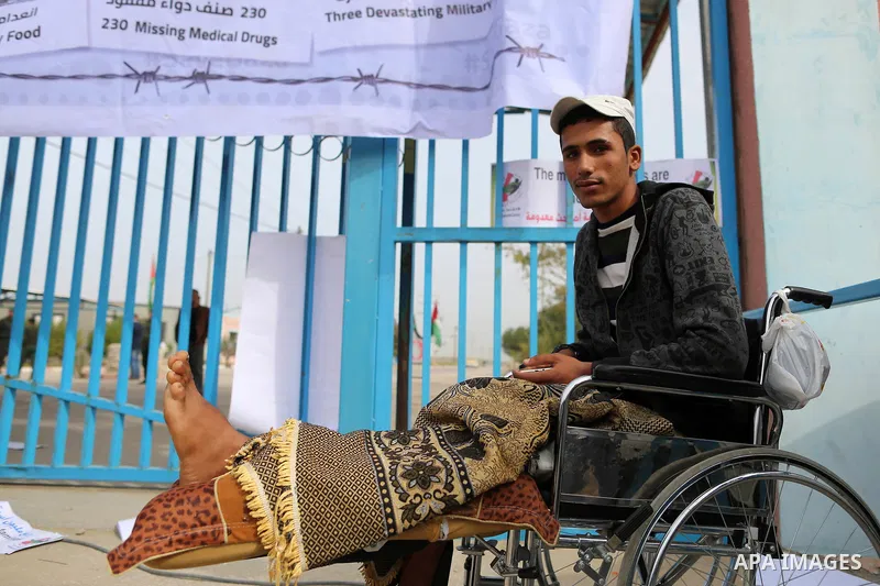Wounded and disabled Palestinians take part in a protest against the siege on the Gaza Strip, at Erez crossing, in the northern Gaza Strip, on February 8, 2018. Israel has maintained a siege on Gaza for a decade which it...