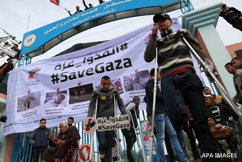 Wounded and disabled Palestinians take part in a protest against the siege on the Gaza Strip, at Erez crossing, in the northern Gaza Strip, on February 8, 2018. Israel has maintained a siege on Gaza for a decade which it...